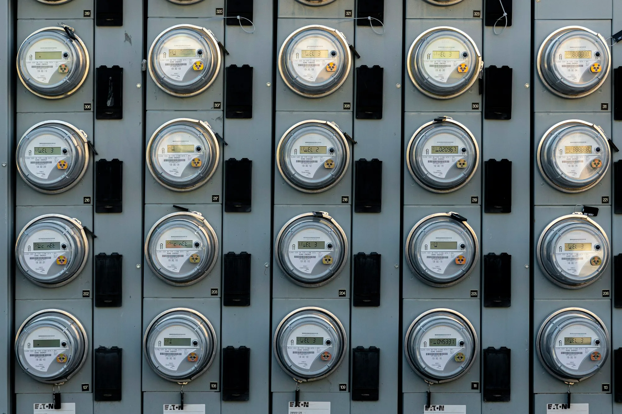 A domestic electricity meter mounted on an exterior wall